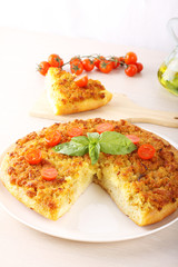 Pizza with breadcrumbs, onion and tomatoes