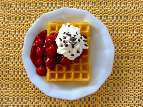 Golden waffle with Cherries and cream - picture