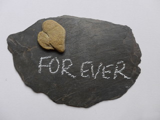 for ever - stone heart on a slate plate - picture