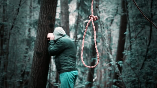The noose before the man in the woods