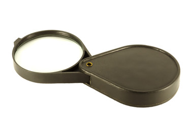 Folding magnifying glass, isolated