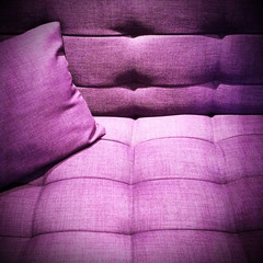 Purple sofa under the light