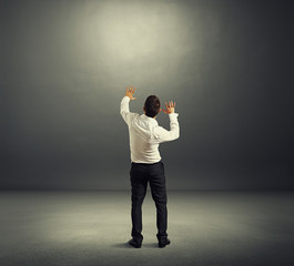 startled man in dark room