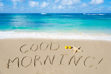 Sign "Good morning" on the beach