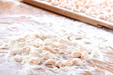Gnocchi On Wooden Table