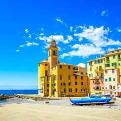 Camogli church on sea, boats and beach view. Liguria, Italy