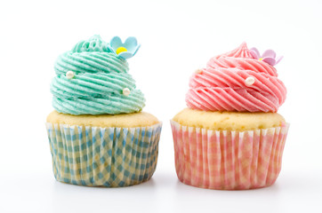 Vanilla cupcakes isolated white background