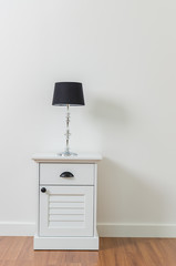 Lamp on bedside table