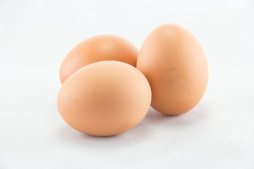three eggs isolated on white background