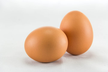 two eggs are isolated on a white background