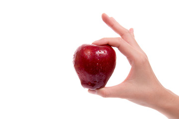 Woman's hand with an apple
