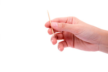 Toothpicks in hand isolated on white