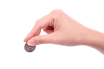 woman's hand holding Thai coins isolated on white
