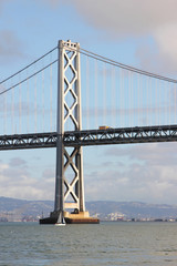 Fototapeta premium Boat and San Francisco bay bridge