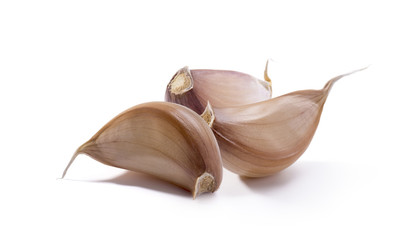 Three garlic segments isolated on white
