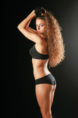 Portrait of young beautiful fitness woman