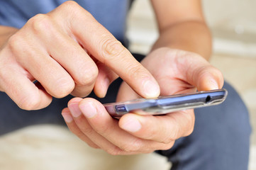 young man using a smartphone
