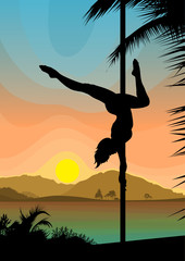 Pole dancer on the beach in front of vivd sky and sea