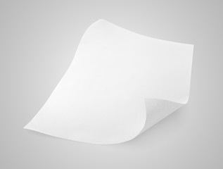 Blank sheet of white paper on gray