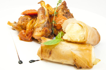 rabbit stew with mushroom sauce and cheese rolls