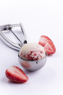 Ice cream strawberry vanilla scoop and many berries