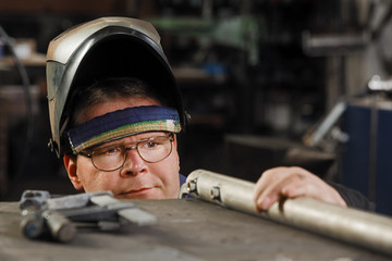 Blacksmith In His Workshop