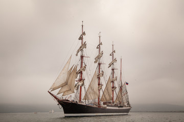 Fototapeta na wymiar Old ship sailing in the sea
