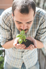 handsome stylish man gardening