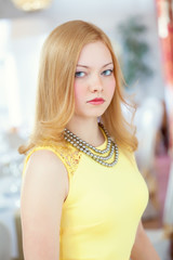 Portrait of beautiful red-haired young woman