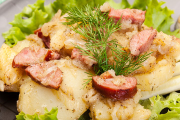 Scalloped potatoes with sausage and bacon