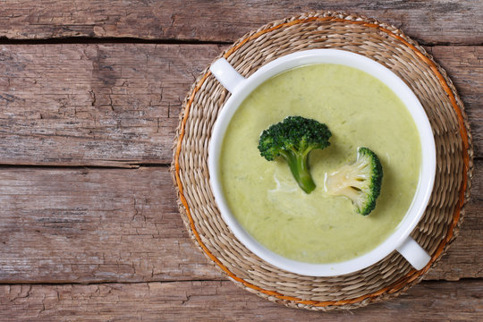 Cream soup of broccoli on the table top view
