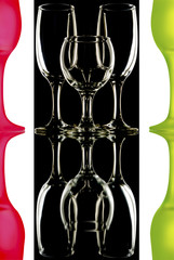 glass wine glasses on black and white background with reflection