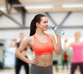 sporty woman with water bottle