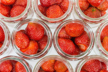 Strawberrys in jars. Top view.