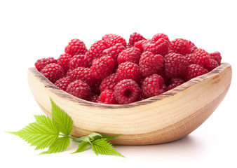 raspberries in wooden bowl