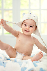 Happy baby with cap