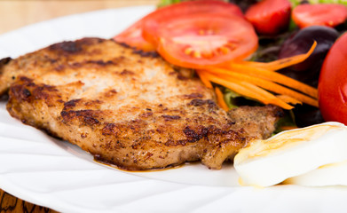 Grilled beef steak with salad