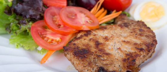 Grilled beef steak with salad