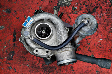 Old worn out turbocharger of a turbo diesel engine © Bartkowski