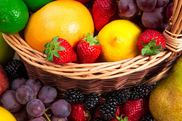 Variety of fresh fruits in wicker basket