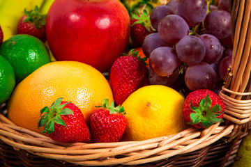 Variety of fresh fruits in wicker basket