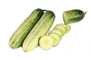 Cucumber and slices isolated over white background