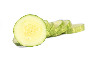Cucumber and slices isolated over white background