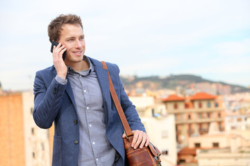 Man on smartphone - young business man talking
