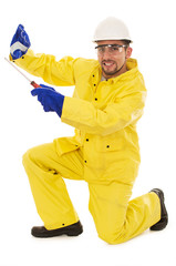 man with screwdriver protective suit