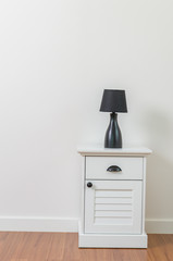 Lamp on bedside table