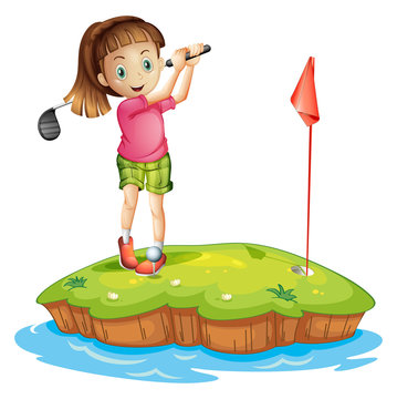 A cute little girl golfing