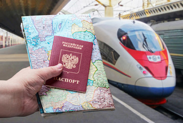 Russian passport with a map on the background of high-speed trai