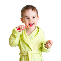 kid brushing teeth isolated on white