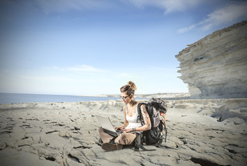 typing at the seaside